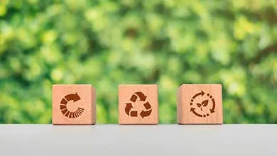 Environment and recycling concept, wooden cube blocks with recycling symbol