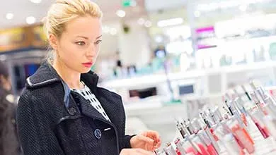 Female shopping in a cosmetic store